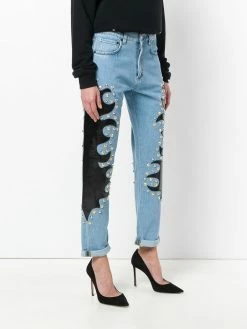 Moschino studded patch straight jeans