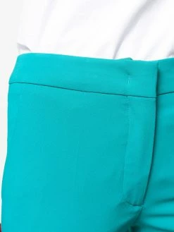 Moschino flared mid-rise trousers