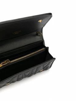 Moschino monogram-quilted clutch bag