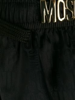 Moschino logo plaque swimming shorts