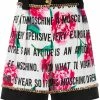 Moschino chain-trimmed rose-print shorts