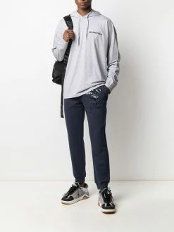 Moschino Milano print track pants