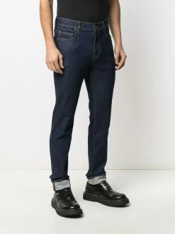 Moschino question mark embroidered jeans