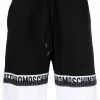 Moschino logo-print panelled swim trunks