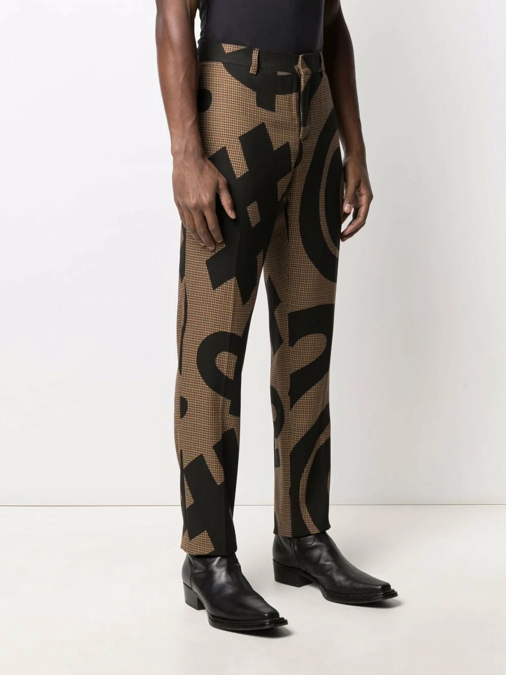 Promo โ๏ธ Moschino Graphic print pressed crease trousers ๐ 5 Moschino graphic-print pressed-crease trousers