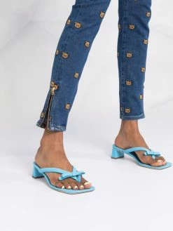 Moschino Teddy-embroidered skinny jeans