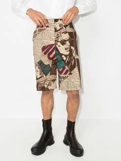 Moschino newspaper print Bermuda shorts