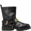 Moschino logo-lettered stirrup-detail biker boots