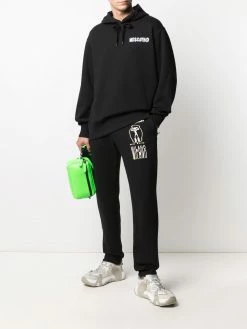 Moschino Warped Glitch Artworks print track pants