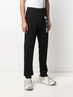 Moschino Warped Glitch Artworks print track pants