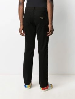 Moschino logo-lettering slim-fit jeans