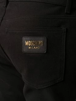Moschino logo-lettering slim-fit jeans