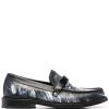 Moschino abstract-print logo loafers