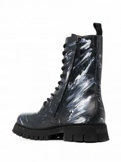 Moschino paint-splatter combat boots
