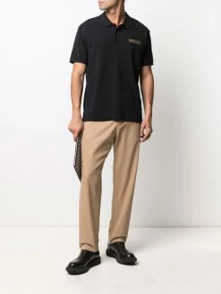 Moschino painted-logo polo shirt