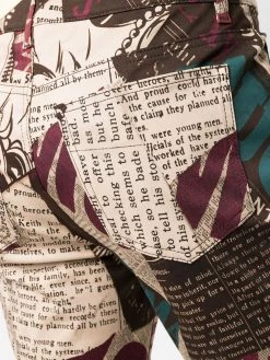 Moschino newspaper-print stretch-gabardine trousers