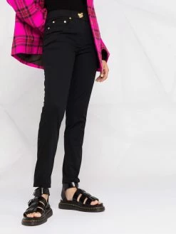 Moschino teddy-plaque slim-cut trousers