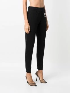 Moschino embellished-logo track pants