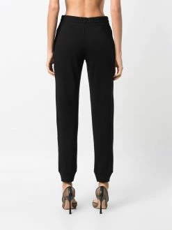 Moschino embellished-logo track pants