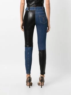 Moschino contrasting-panel skinny trousers