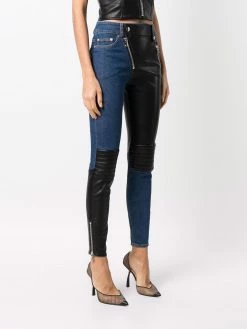 Moschino contrasting-panel skinny trousers