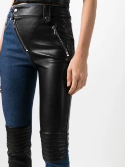 Moschino contrasting-panel skinny trousers