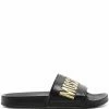 Moschino logo-embossed pool slides