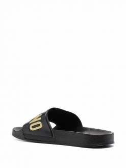 Moschino logo-embossed pool slides
