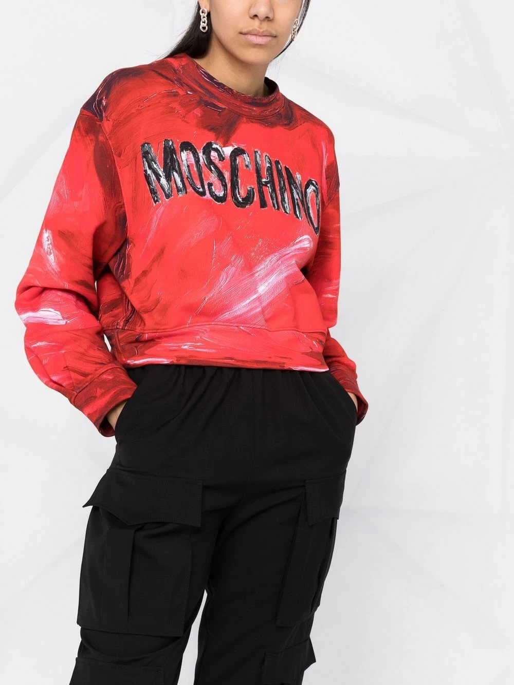 Hot Sale ๐ Moschino Brushstroke logo print cropped sweatshirt ๐ 7 Moschino brushstroke logo-print cropped sweatshirt