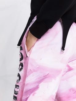 Moschino abstract-print branded track trousers