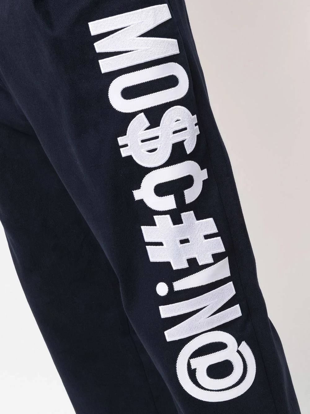 Best deal ๐ Moschino Symbols stretch gabardine trousers ๐ 7 Moschino Symbols stretch-gabardine trousers