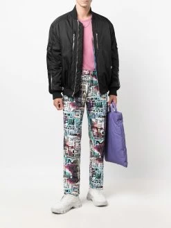 Moschino graphic-print straight-leg trousers