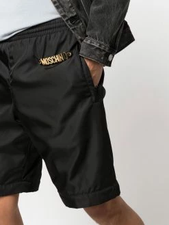 Moschino logo-plaque adjustable track pants