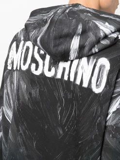 Moschino painted logo print hoodie