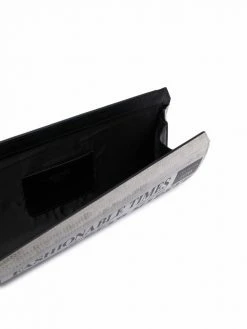 Moschino logo newspaper-print clutch bag