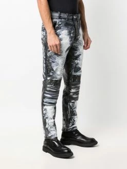 Moschino graphic-print skinny trousers