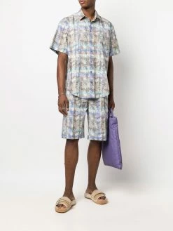 Moschino leaf-print knee-length shorts