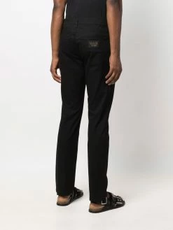 Moschino logo-plaque straight-leg trousers