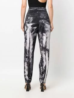 Moschino slim-fit paint-print trousers