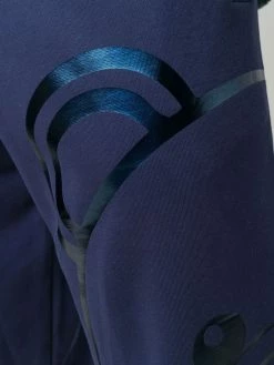 Moschino metallic Teddy print track pants