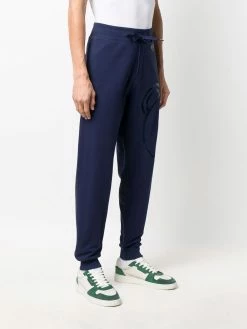 Moschino metallic Teddy print track pants