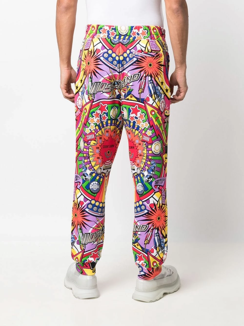 Coupon โ๏ธ Moschino Logo print pinball trousers ๐ 6 Moschino logo-print pinball trousers
